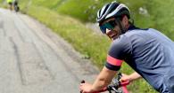 Duncan Russell riding bike in the mountains.