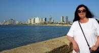 Lorie Kennerly poses by the Mediterranean Sea in Israel. 