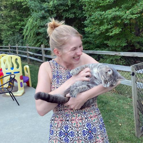 Keatley Pihl and cat outdoors